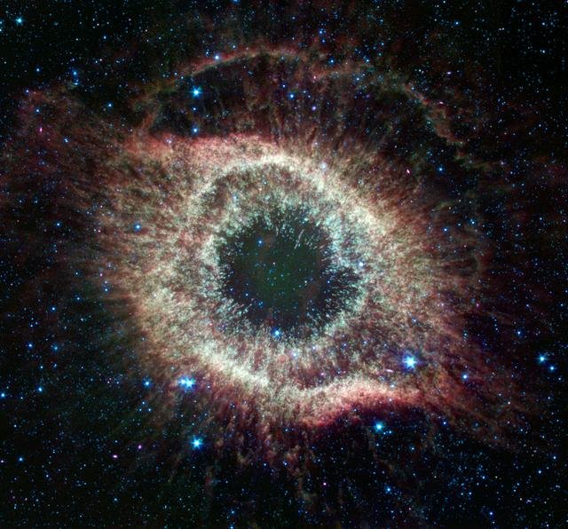 Spitzer Celebrates Fourth Anniversary with Celestial Fireworks