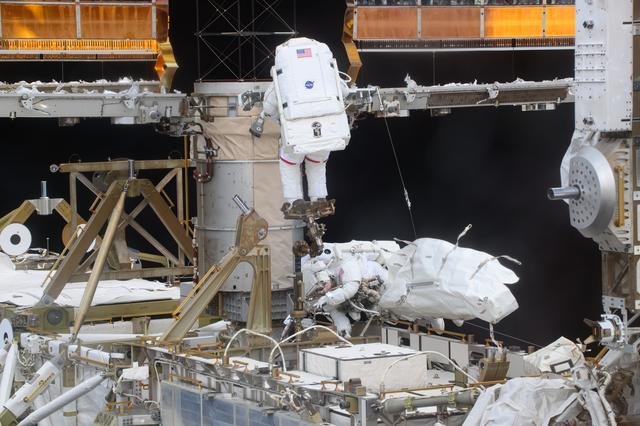 NASA astronauts Anne McClain and Nichole Ayers are pictured during a spacewalk